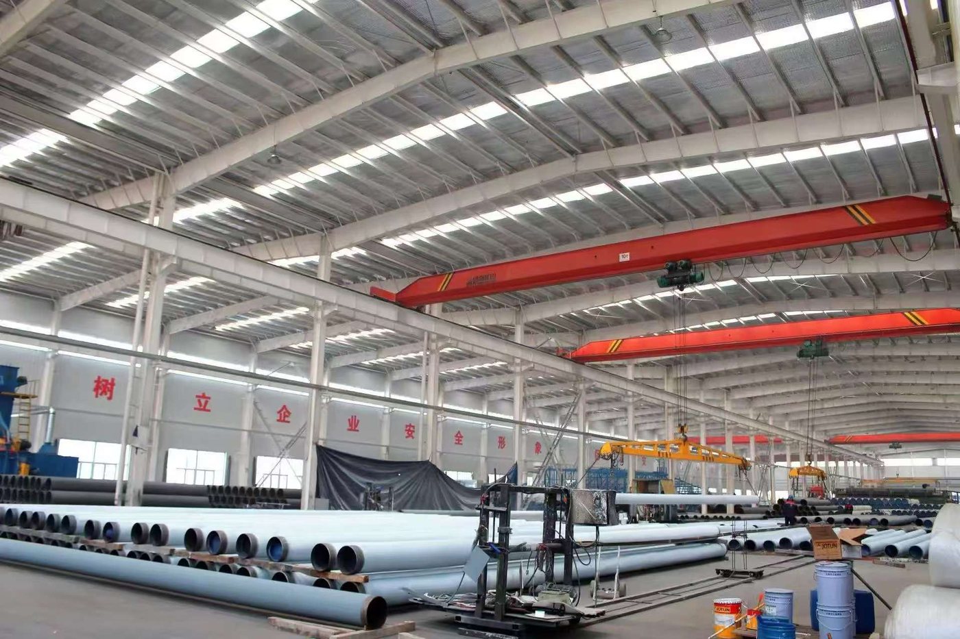 Pipe welding and sizing station